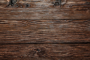 Vintage brown wooden surface top view.