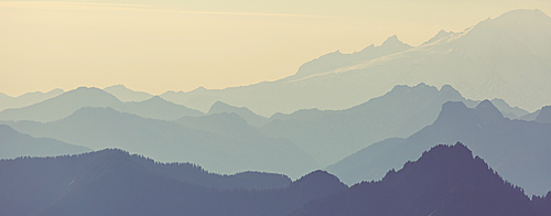 Beautiful natural background. Mountain silhouette at the sunset.