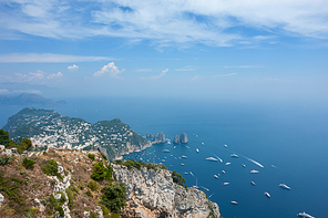 view of Faraglioni cliffs and Tyrrhenian Sea on Capri Island, Italy