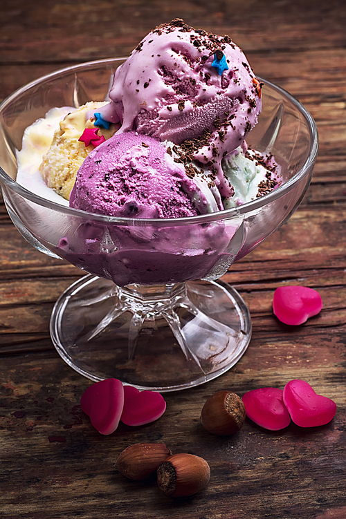 fruit ice cream in  bowl.The image is tinted in vintage style.Shallow DOF