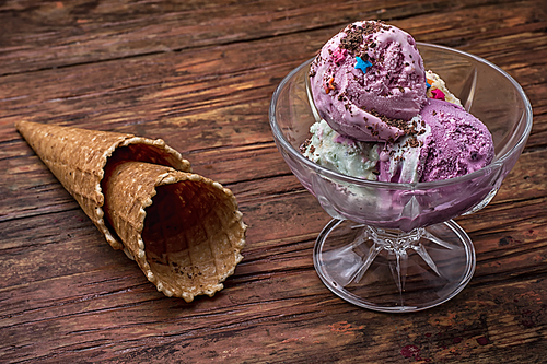 fruit ice cream in  bowl.The image is tinted in vintage style.Shallow DOF