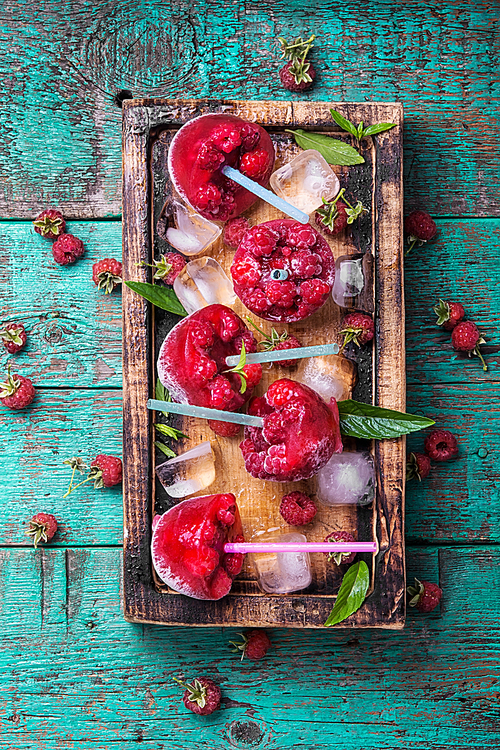 Close up of frozen raspberry juice with ice