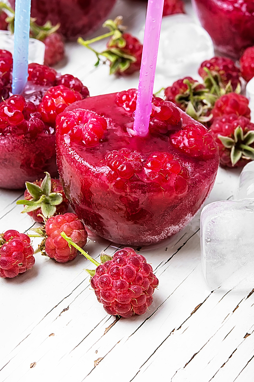 Close up of frozen raspberry juice with ice