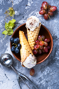 Summer grape ice cream in a waffle cup cone