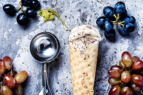 Ice cream cone vanilla and grape flavor. Summer menu concept