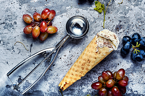 Ice cream cone vanilla and grape flavor. Summer menu concept