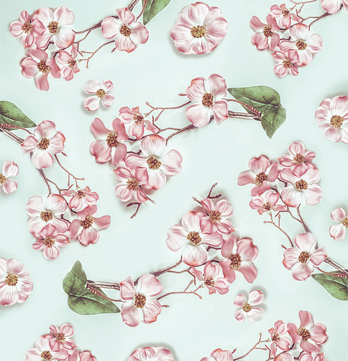 Pastel floral pattern with pink blossom flowers, top view, flat lay