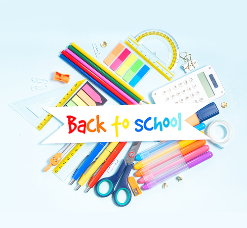 Back to school concept with school supplies on blue background with back to scloot greetings