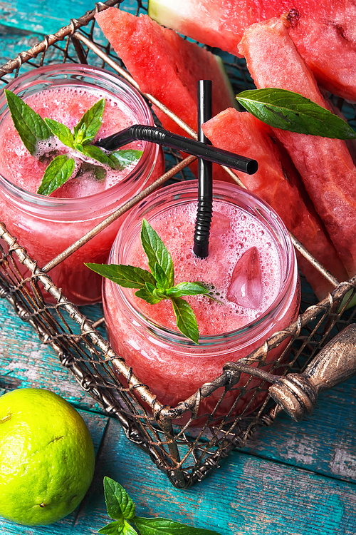 summer watermelon fresh smoothie in glass jars