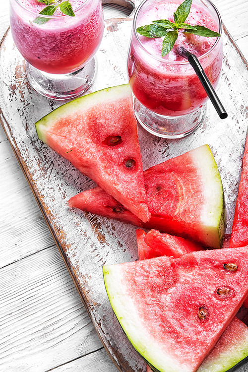 summer watermelon fresh smoothie in glass jars