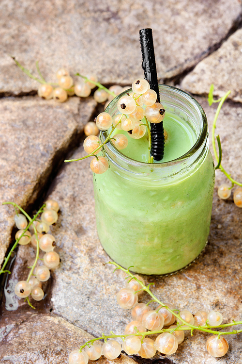 drink smoothies from currant in a jar on stone background