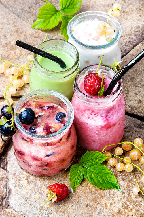 drink smoothies from currant in jar on a stone background