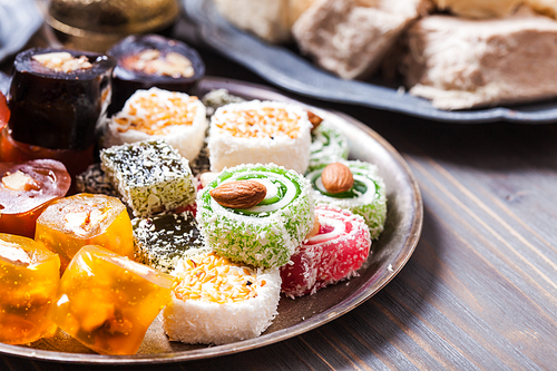 Turkish delight lokum with nuts on metal plate