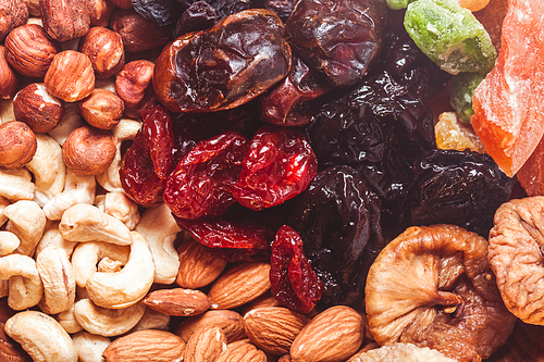 Dry fruits and nuts background - close up healthy sweets