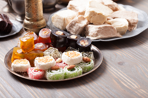 Turkish delight lokum with nuts on metal plate