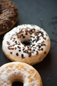 Set of donuts on black background