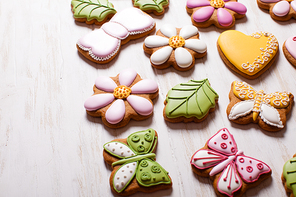 A set of delicious homemade gingerbreads of various shapes laid out on the table