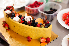 Tasty colorful cake with fresh summer berries