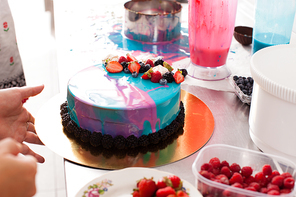Tasty colorful cake with fresh summer berries