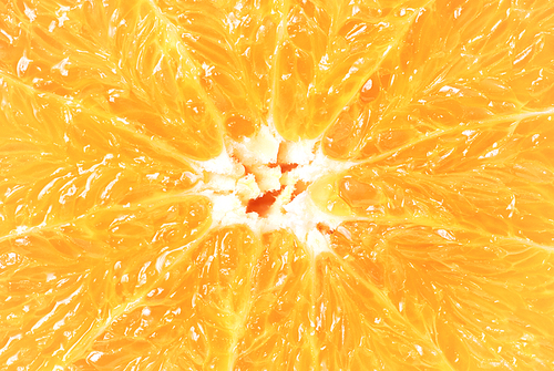 Food background of juicy fresh orange. Macro shot