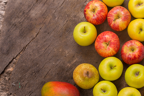 fruits on a old wooden table, studio picture, with copy space. Free space for text