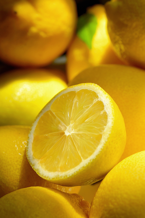 Still life with fresh yellow lemons with natural light