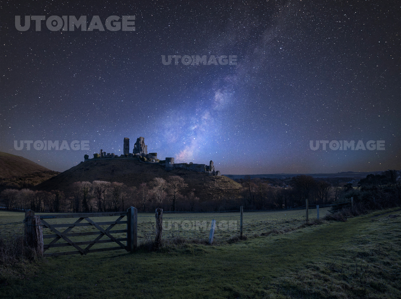 Stunning vibrant Milky Way composite image over landscape of Medieval ...