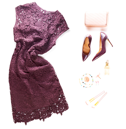 Fashion flat lay scene. Hight heel shoes, dress, bag, dressing up for party fashion accessoires.