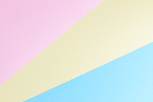 Color blocks paper pink, yellow and blue background