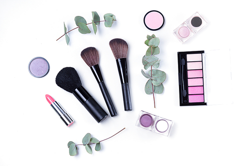 Professional makeup tools with beauty products, flatlay on white background