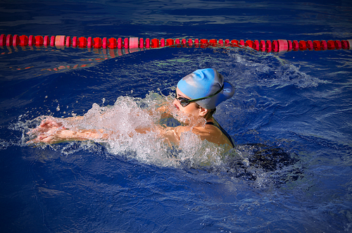 Young woman swimmer in swimming pool