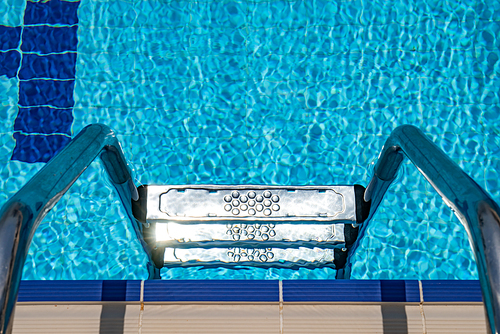 Grab bars ladder in the swimming pool