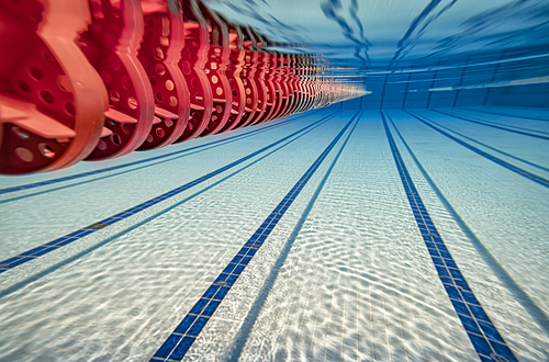 Olympic Swimming pool underwater background.