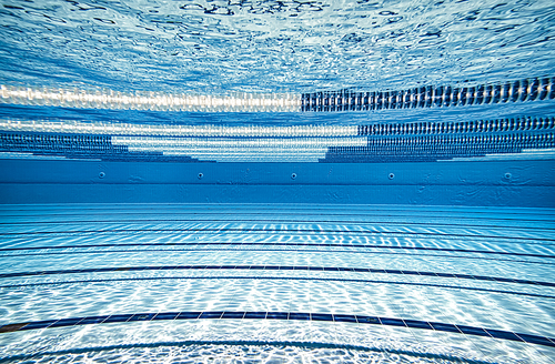 Olympic Swimming pool underwater background.