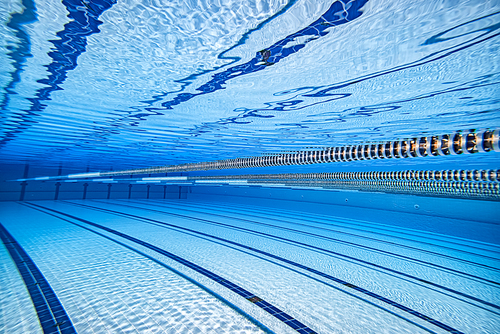 Olympic Swimming pool underwater background.