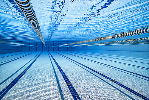 Olympic Swimming pool underwater background.