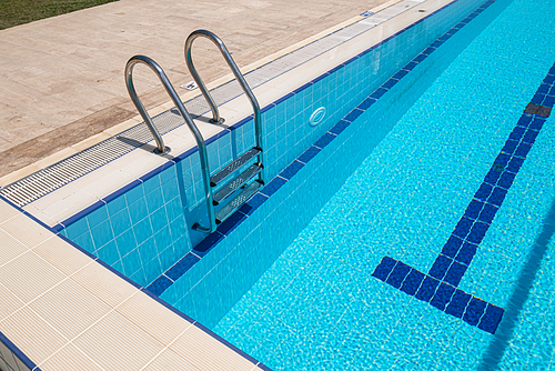 Grab bars ladder in the swimming pool