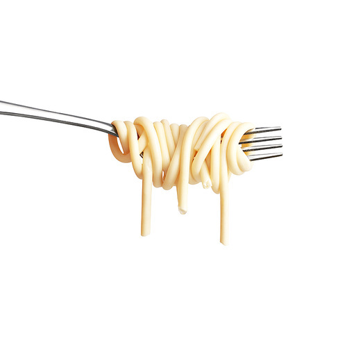 Creative still life photo of a fork with raw pasta isolated on white.