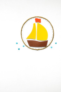 Creative concept photo of a boat made of paper on white background.