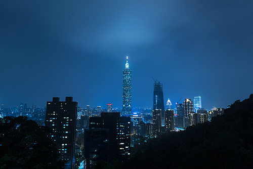 TAIPEI, TAIWAN - NOVEMBER 21, 2016: Taipei 101 building is a famous landmark was taken at sunset from elephant mountain