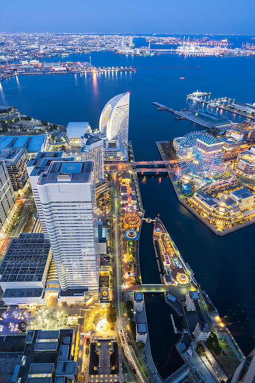 Aerial view of panoramic modern city in Yokohama City Japan with blue hour after sunset in th evening. Yokohama is the second largest city in Japan by population.