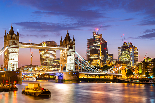 London Tower Bridge with London downtown skylines building in background, London UK.