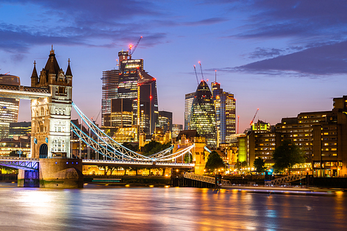 London Tower Bridge with London downtown skylines building in background, London UK.