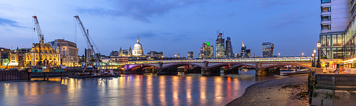 Panoramic of St paul cathedral with river thames sunset twilight in London UK.