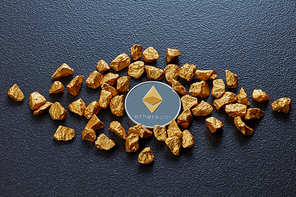 Coin ethereum and gold nuggets as world trends both isolated on black background Digital virtual currency electronic money mining blockchain exchange innovation business