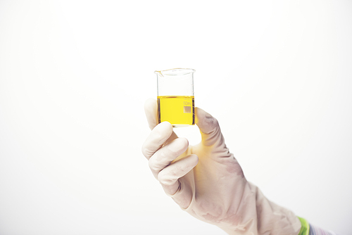 Chemical liquid in glassware of science lab on white background