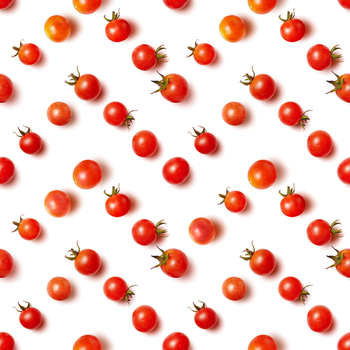 flat lay of beautiful trendy seamless pattern cherry tomato isolated on white
