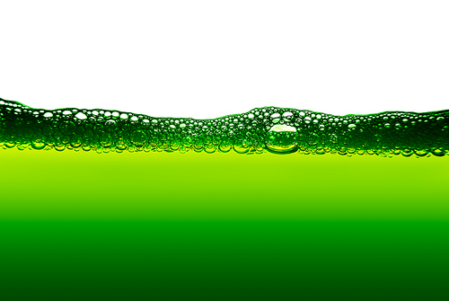 Water with bubbles on green background.