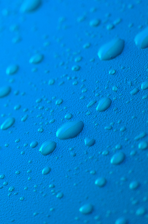 Water drops on blue background.