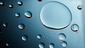 water drop texture as abstract nature blue gradient background